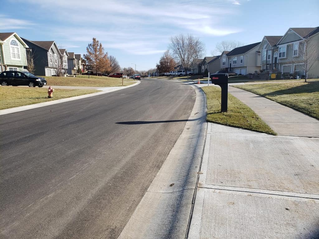 Pavement, new driveway entrances and sidewalks on Shenandoah St in Edgerton after the street reconstruction was completed in 2019